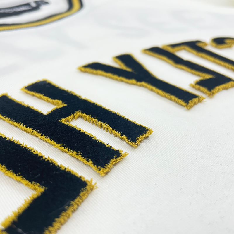 REFLECTED VARSITY TEE