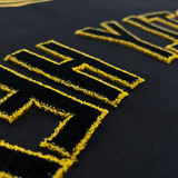 REFLECTED VARSITY TEE