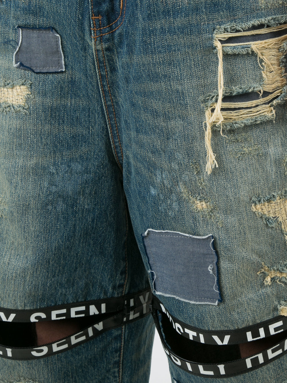 DESTROYED TICKER FEED JEANS – Mostly Heard Rarely Seen