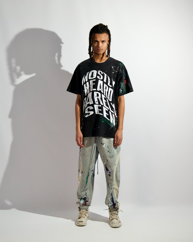 "WARPED TEXT SPLATTER PAINT" TEE - Mostly Heard Rarely Seen