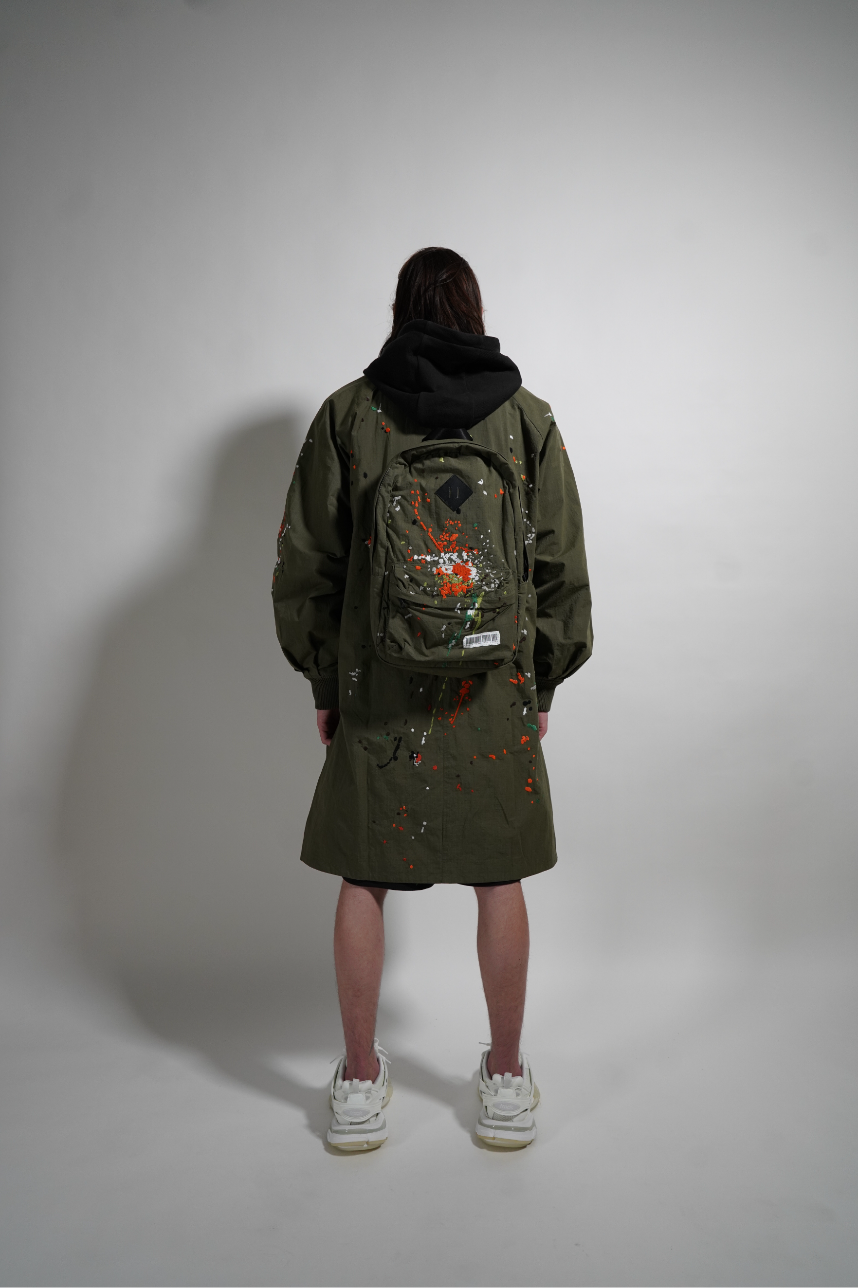 BACKPACK LONG COAT – Mostly Heard Rarely Seen